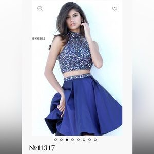 Sherri Hill. Size 8. Two-piece Royal Dress with beaded top.